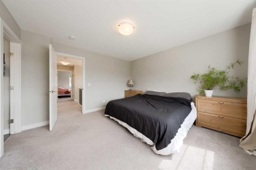 41 Precedence Glen, Cochrane, AB - Indoor Photo Showing Bedroom