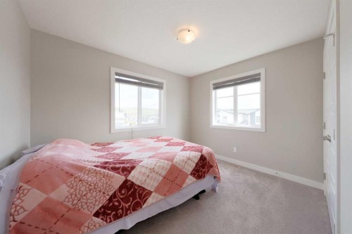 41 Precedence Glen, Cochrane, AB - Indoor Photo Showing Bedroom