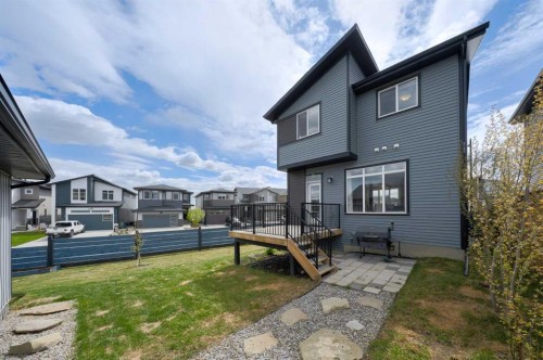 41 Precedence Glen, Cochrane, AB - Outdoor With Deck Patio Veranda