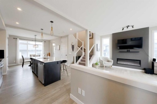 41 Precedence Glen, Cochrane, AB - Indoor With Fireplace