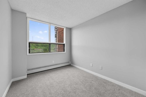 902-145 Point Drive Nw, Calgary, AB - Indoor Photo Showing Other Room