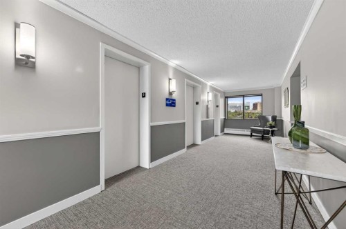 902-145 Point Drive Nw, Calgary, AB - Indoor Photo Showing Other Room