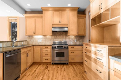 4-124 Silvertip Ridge, Canmore, AB - Indoor Photo Showing Kitchen With Double Sink