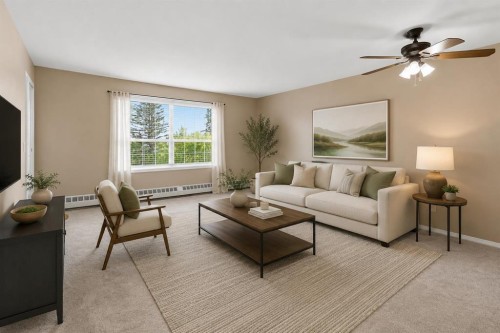 307-105 7 Avenue Se, High River, AB - Indoor Photo Showing Living Room