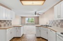 307-105 7 Avenue Se, High River, AB  - Indoor Photo Showing Kitchen With Double Sink 