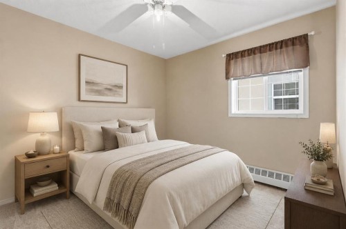 307-105 7 Avenue Se, High River, AB - Indoor Photo Showing Bedroom