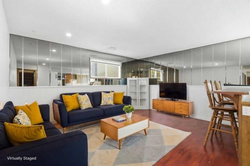 19 Templevale Way Ne, Calgary, AB - Indoor Photo Showing Living Room