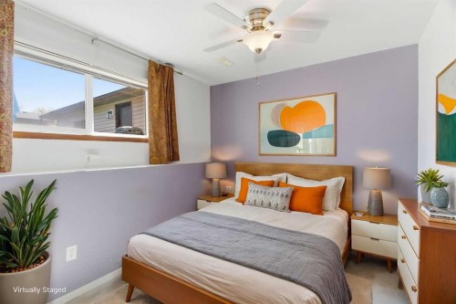 19 Templevale Way Ne, Calgary, AB - Indoor Photo Showing Bedroom