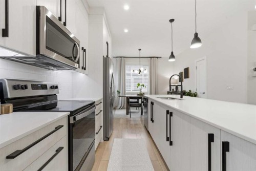 322-72 Cornerstone Manor Ne, Calgary, AB - Indoor Photo Showing Kitchen With Upgraded Kitchen