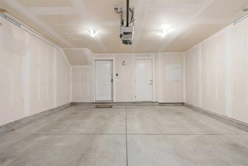 322-72 Cornerstone Manor Ne, Calgary, AB - Indoor Photo Showing Garage