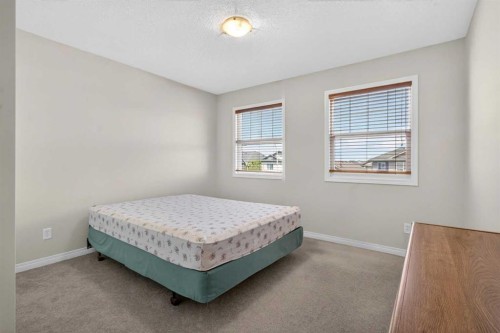 156 Saddlecrest Park Ne, Calgary, AB - Indoor Photo Showing Bedroom