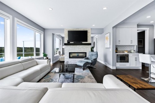 219 Legacy Mount Se, Calgary, AB - Indoor Photo Showing Living Room With Fireplace
