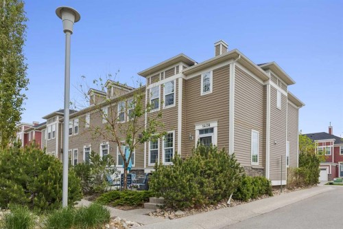 1408-155 Silverado Skies Link Sw, Calgary, AB - Outdoor With Facade