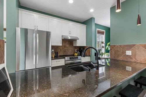 1408-155 Silverado Skies Link Sw, Calgary, AB - Indoor Photo Showing Kitchen With Stainless Steel Kitchen With Double Sink With Upgraded Kitchen
