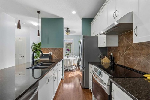 1408-155 Silverado Skies Link Sw, Calgary, AB - Indoor Photo Showing Kitchen With Stainless Steel Kitchen With Double Sink With Upgraded Kitchen