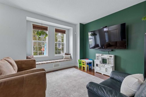 1408-155 Silverado Skies Link Sw, Calgary, AB - Indoor Photo Showing Living Room