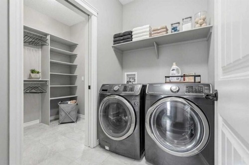 9 Kingsbridge Place Se, Airdrie, AB - Indoor Photo Showing Laundry Room