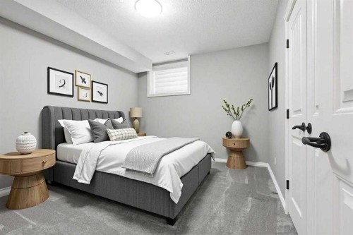 9 Kingsbridge Place Se, Airdrie, AB - Indoor Photo Showing Bedroom