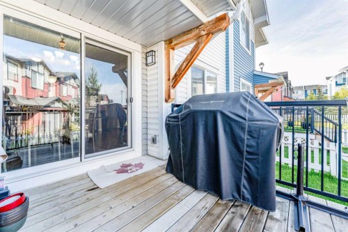 1402 Jumping Pound Common, Cochrane, AB - Outdoor With Deck Patio Veranda With Exterior