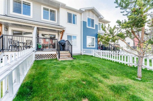 1402 Jumping Pound Common, Cochrane, AB - Outdoor With Deck Patio Veranda