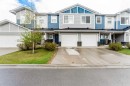 1402 Jumping Pound Common, Cochrane, AB  - Outdoor With Facade 