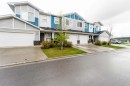 1402 Jumping Pound Common, Cochrane, AB  - Outdoor With Facade 