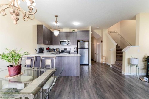 1402 Jumping Pound Common, Cochrane, AB - Indoor Photo Showing Other Room