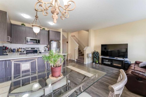 1402 Jumping Pound Common, Cochrane, AB - Indoor Photo Showing Kitchen