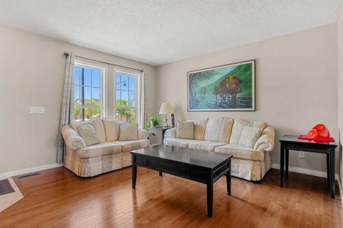 249 Elgin Meadows Park Se, Calgary, AB - Indoor Photo Showing Living Room
