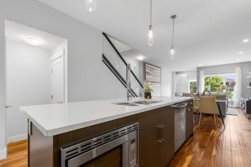 4660 82 Street Nw, Calgary, AB - Indoor Photo Showing Kitchen With Double Sink