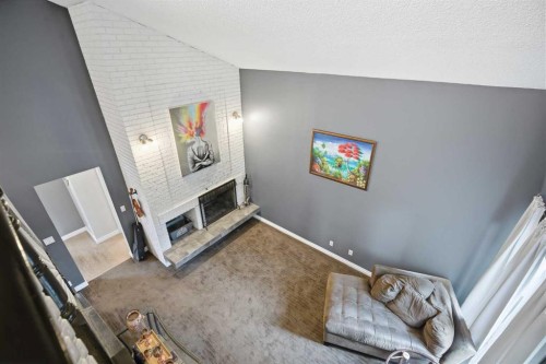 2608 Deer Side Drive Se, Calgary, AB - Indoor With Fireplace