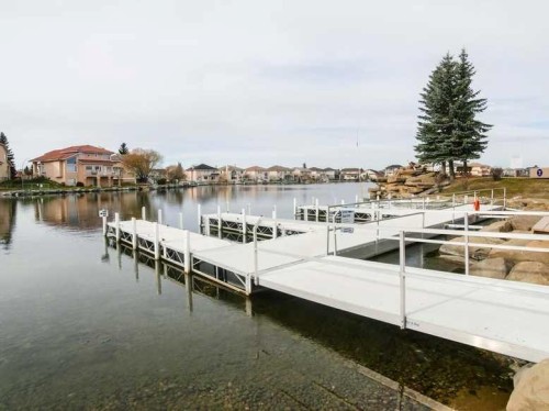 263 Coral Keys Drive Ne, Calgary, AB - Outdoor With Body Of Water With View