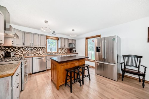 2 Wolf Close, Rural Rocky View County, AB - Indoor Photo Showing Kitchen With Stainless Steel Kitchen With Double Sink