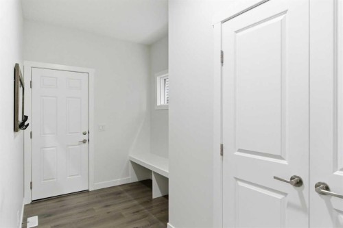 90 Saddlebred Place, Cochrane, AB - Indoor Photo Showing Other Room