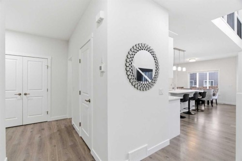 90 Saddlebred Place, Cochrane, AB - Indoor Photo Showing Living Room With Fireplace