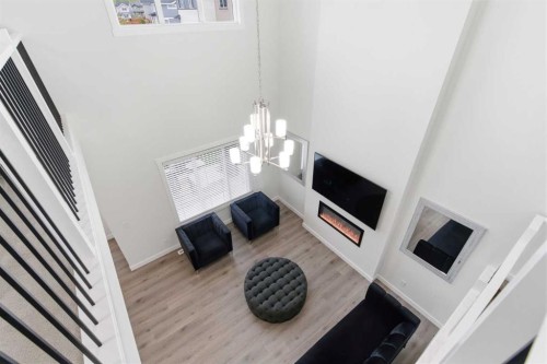 90 Saddlebred Place, Cochrane, AB - Indoor Photo Showing Living Room