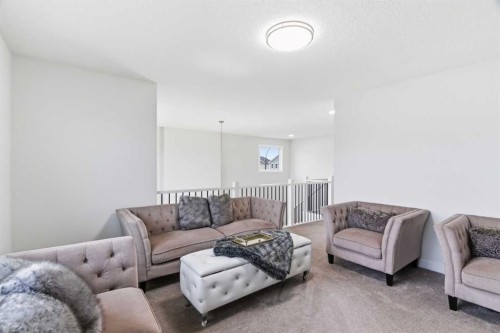 90 Saddlebred Place, Cochrane, AB - Indoor Photo Showing Living Room