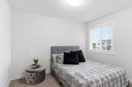 90 Saddlebred Place, Cochrane, AB - Indoor With Storage