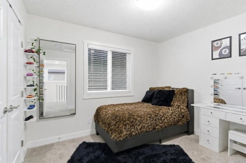 90 Saddlebred Place, Cochrane, AB - Indoor Photo Showing Bedroom