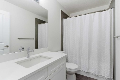 90 Saddlebred Place, Cochrane, AB - Indoor Photo Showing Bedroom
