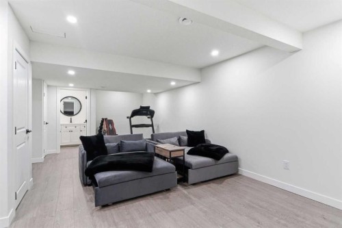 90 Saddlebred Place, Cochrane, AB - Indoor Photo Showing Laundry Room