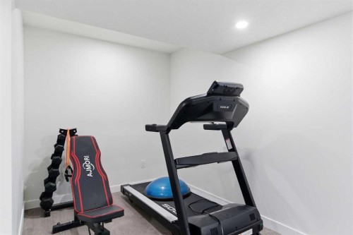 90 Saddlebred Place, Cochrane, AB - Indoor Photo Showing Living Room