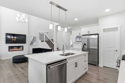 90 Saddlebred Place, Cochrane, AB - Indoor Photo Showing Kitchen With Upgraded Kitchen