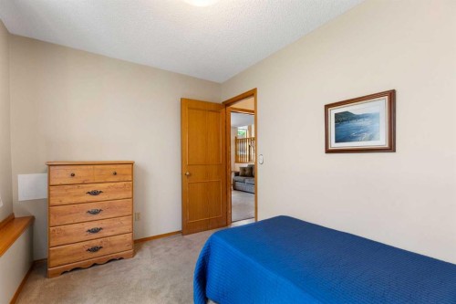 23 Millside Place Sw, Calgary, AB - Indoor Photo Showing Bedroom