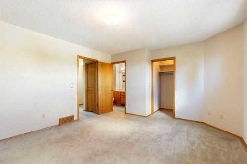 23 Millside Place Sw, Calgary, AB - Indoor Photo Showing Other Room