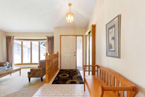 23 Millside Place Sw, Calgary, AB - Indoor Photo Showing Other Room