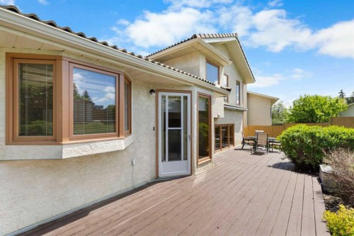 23 Millside Place Sw, Calgary, AB - Outdoor With Deck Patio Veranda With Exterior