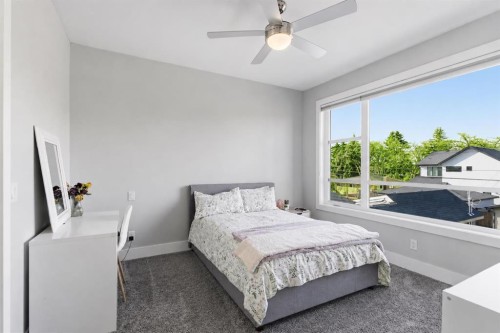 10 Lissington Drive Sw, Calgary, AB - Indoor Photo Showing Bedroom