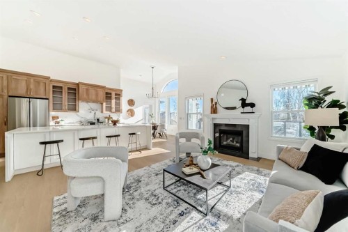 161 West Creek Pond, Chestermere, AB - Indoor Photo Showing Living Room With Fireplace