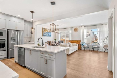 58 Sage Hill Heights Nw, Calgary, AB - Indoor Photo Showing Kitchen With Double Sink With Upgraded Kitchen